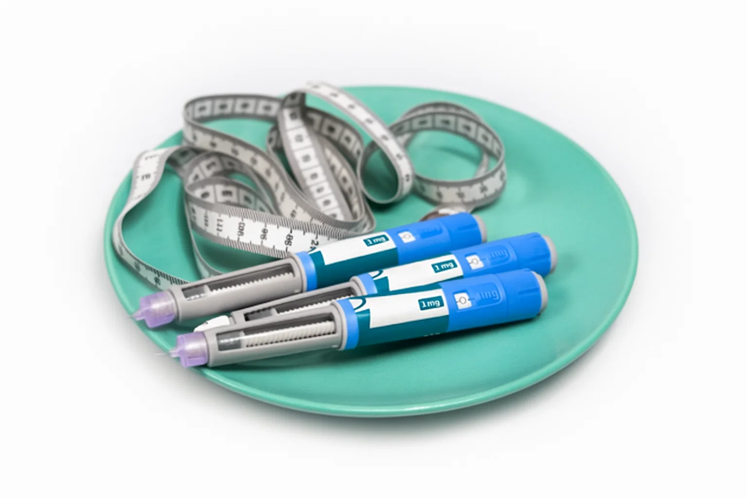Weight loss medications and measuring tape